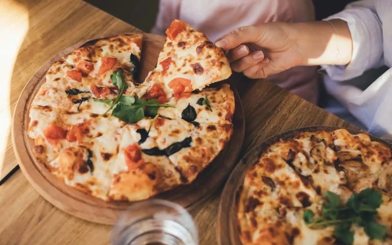 delicious-pizza-meal-shared-at-home-together-2026-01-06-09-36-17-utc