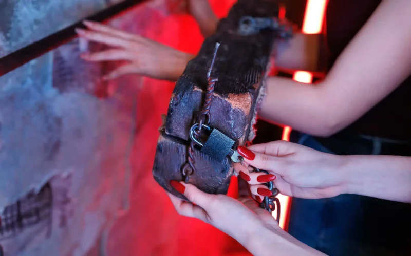 hand-securing-padlock-on-wood-2026-03-20-04-00-17-utc